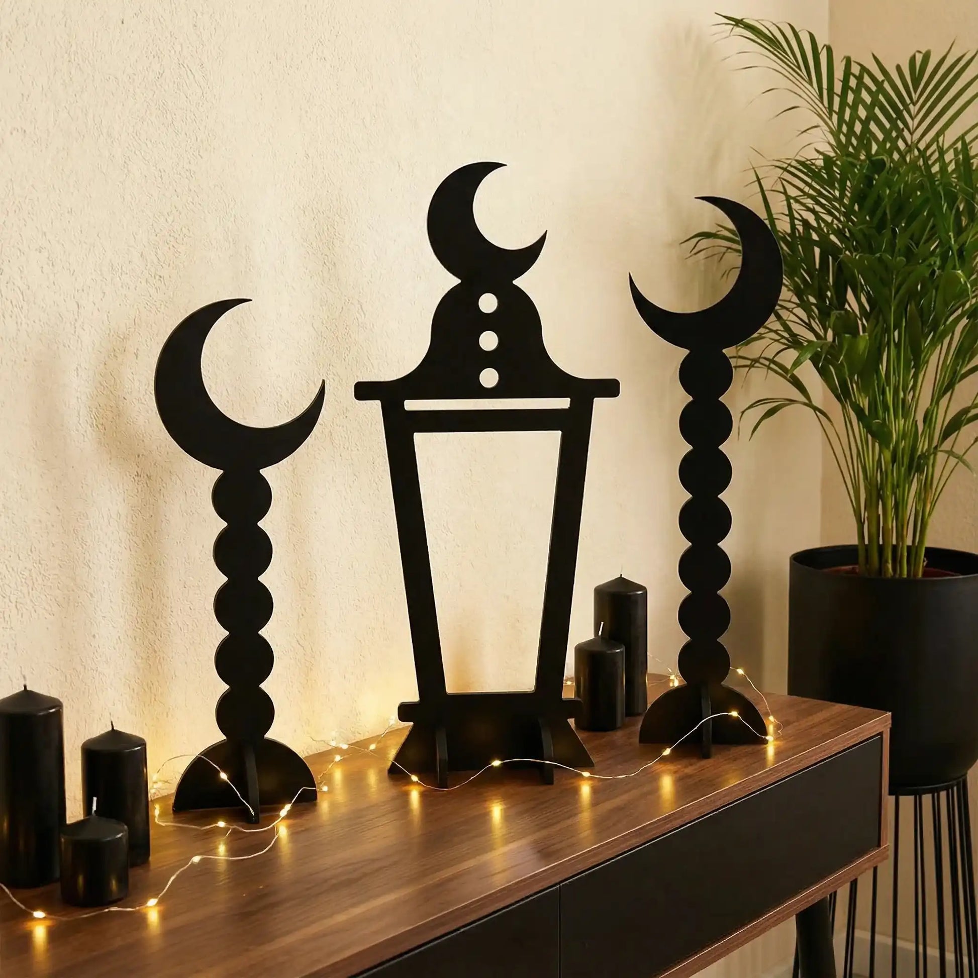 Decorative Accessories For Holy Month Of Ramadan on a wooden surface with plant in bacground