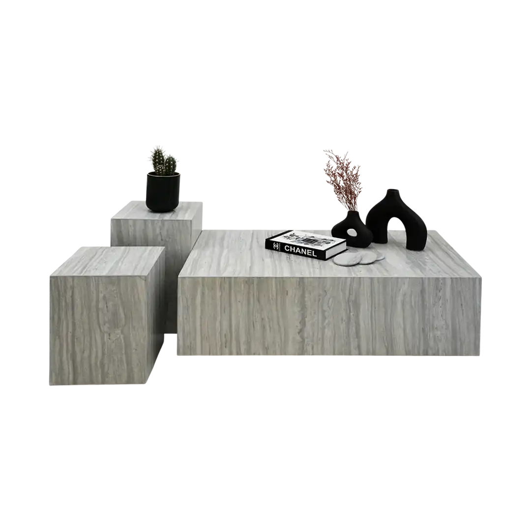 Hugo coffee tables; a set of gray marble coffee table and side tables with decorative items on a white background