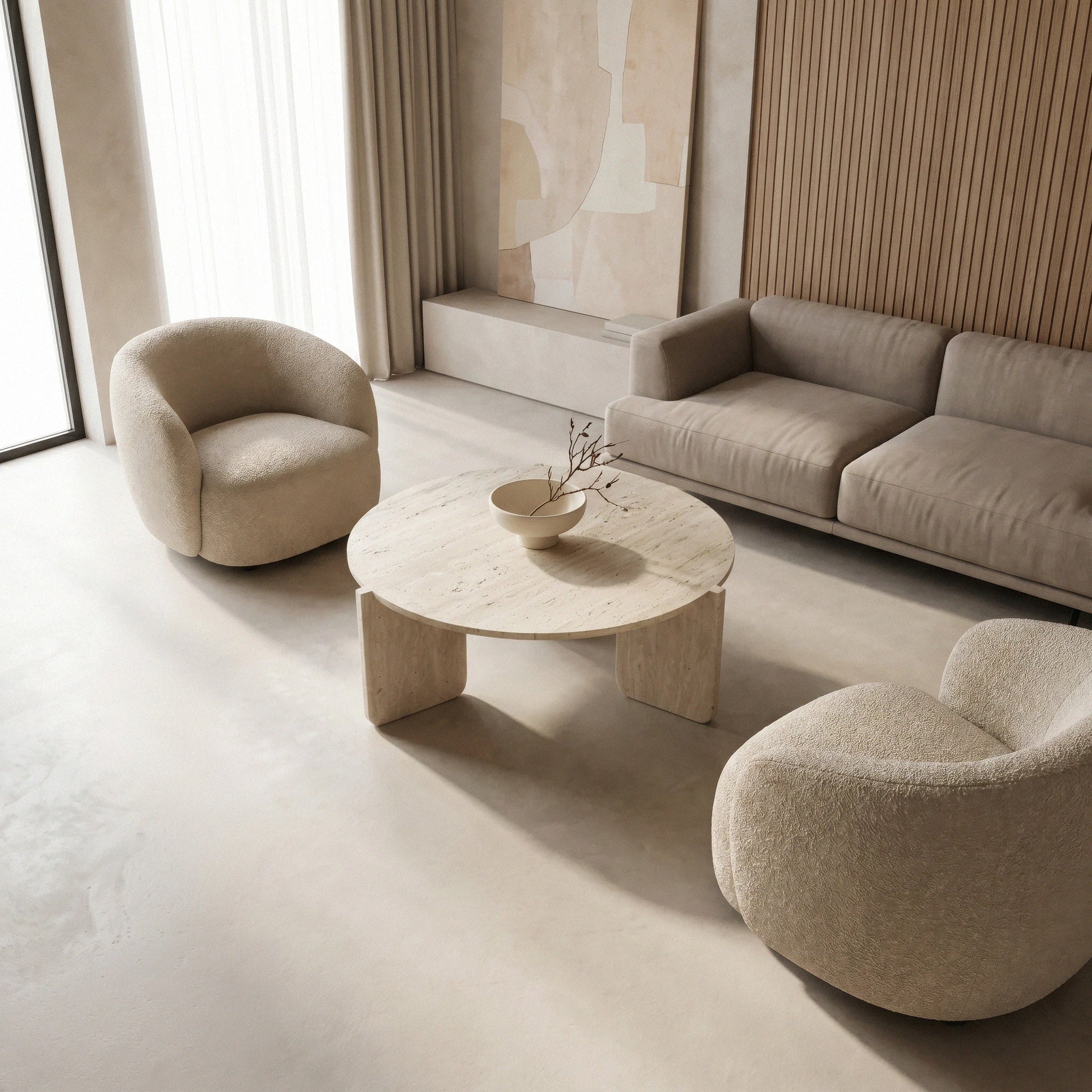 Martina Travertine Coffee Table from Marbeya Charm in a iving room with one sofa and two armchairs 
