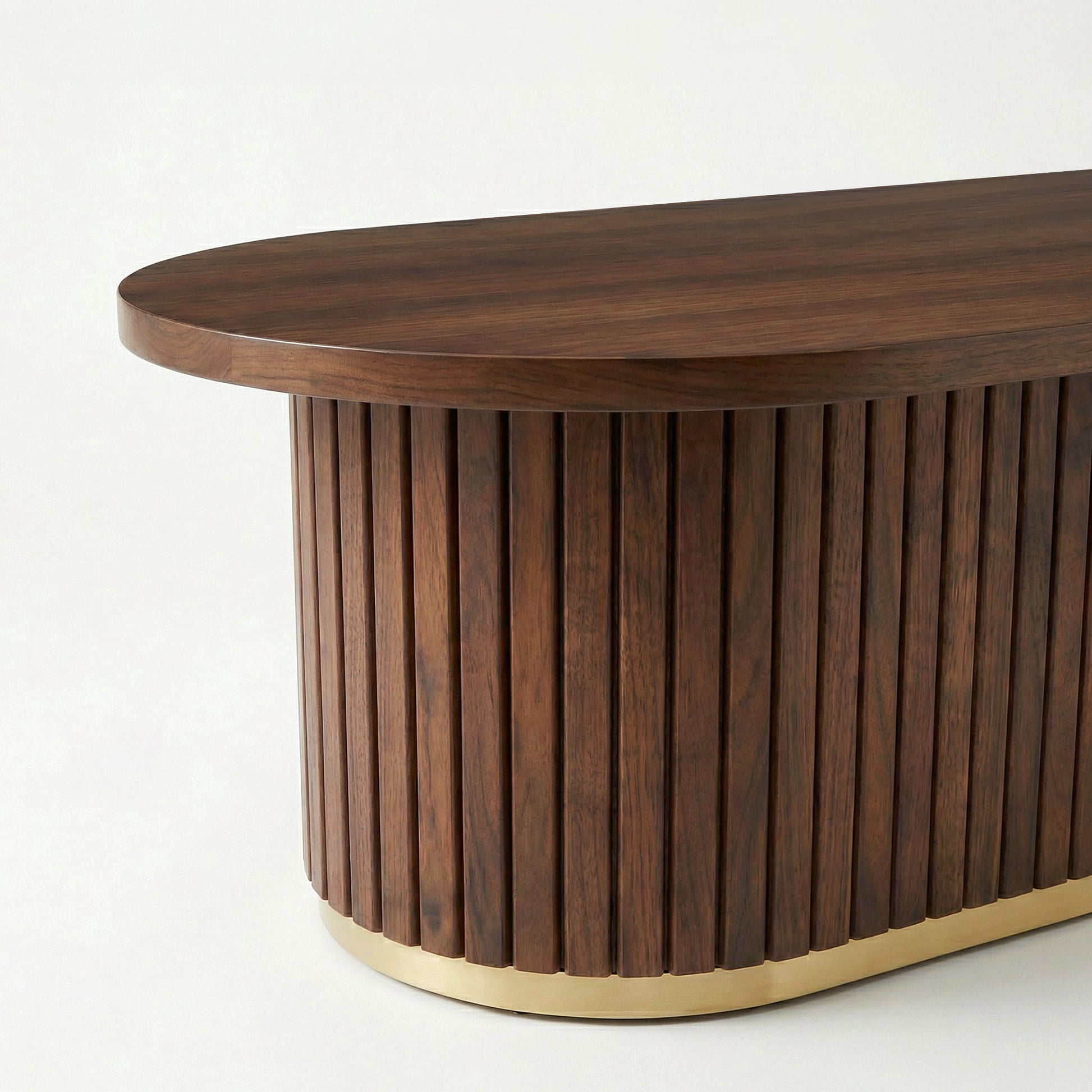 Riva Wooden coffee table with a slatted design and gold base on a white background - Marbeya Charm