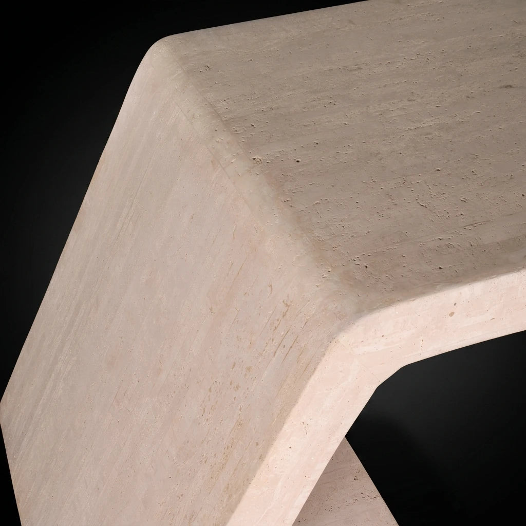 A close-up of Strata Executive desk, our modern natural stone office table from Marbeya Charm, shown against a solid black background.
